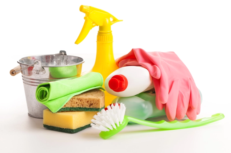 bright colorful cleaning set wooden table
